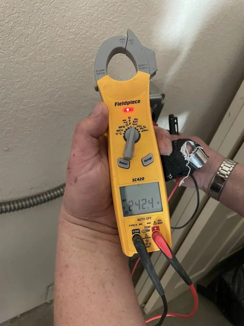 Voltage testing with clamp meter during Generator Installation in Highlands